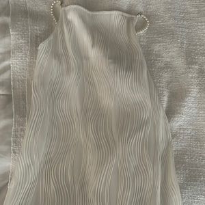 A white sleek dress from Rihoas